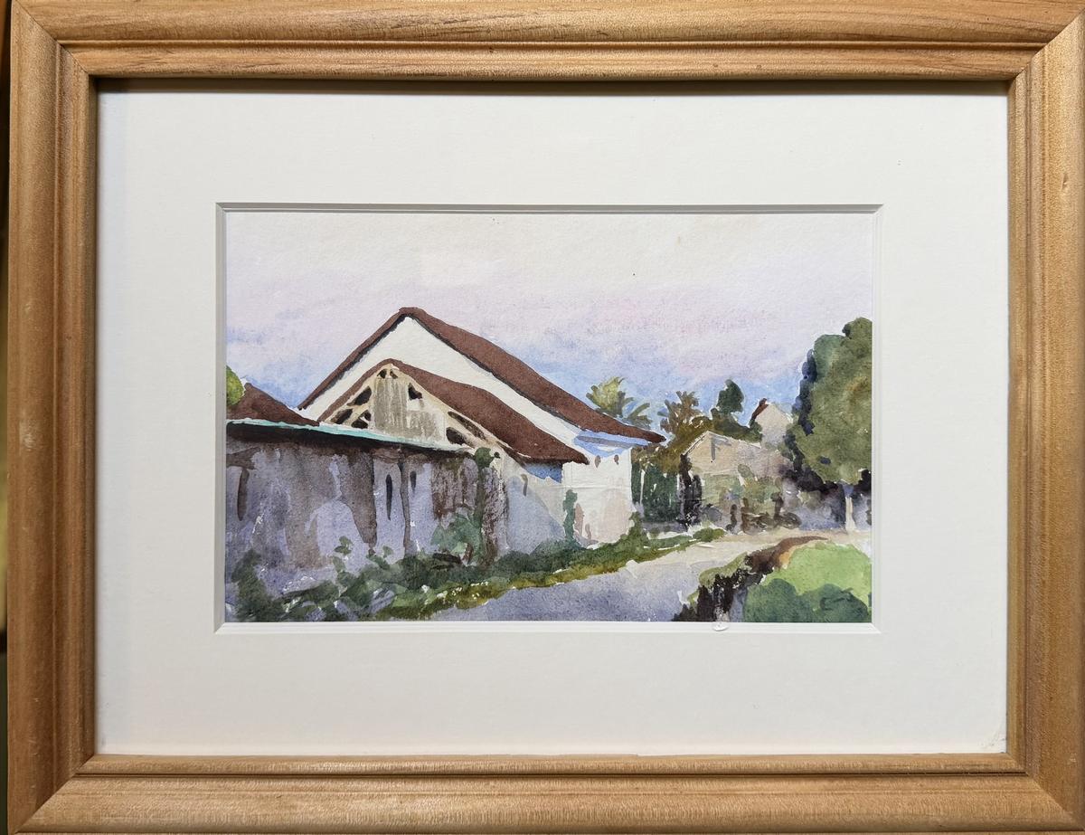 A House in Lodtunduh, shown in its natural wood frame